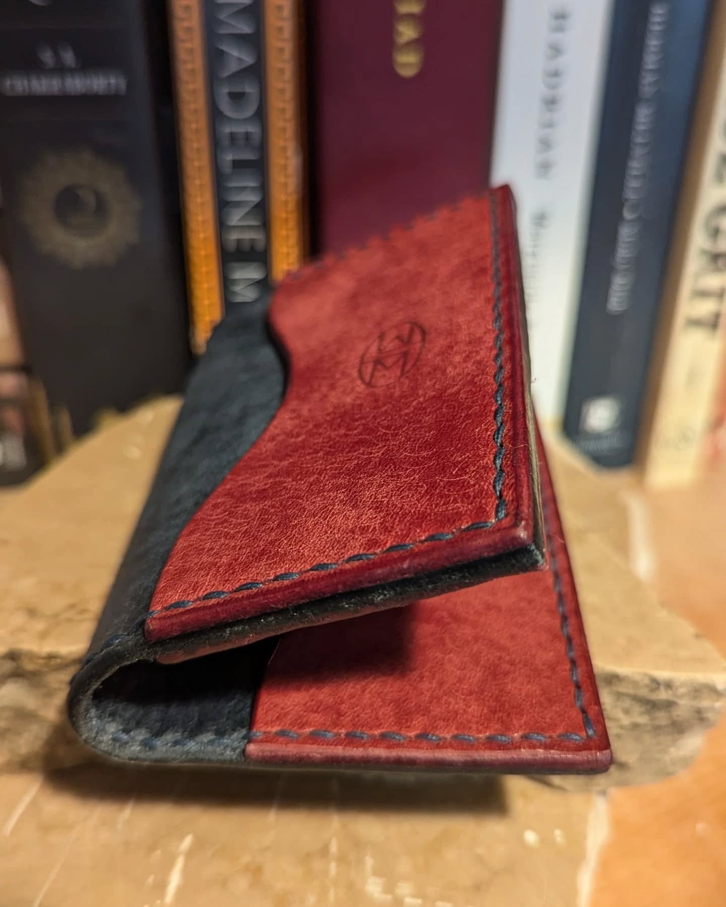 I've tried making a pattern for this style wallet in the past, but was never happy with the results. I tried this pattern from @corterleather…